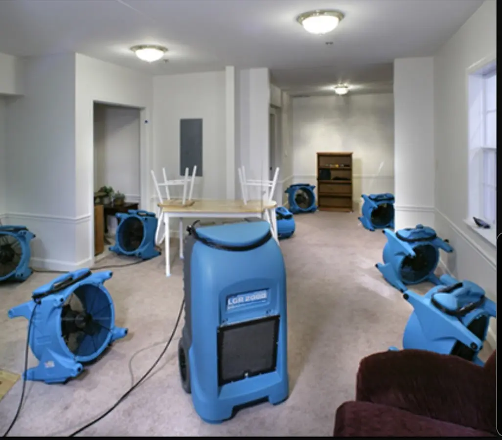 Air movers and dehumidifier setup for Water Damage Restoration in Acworth